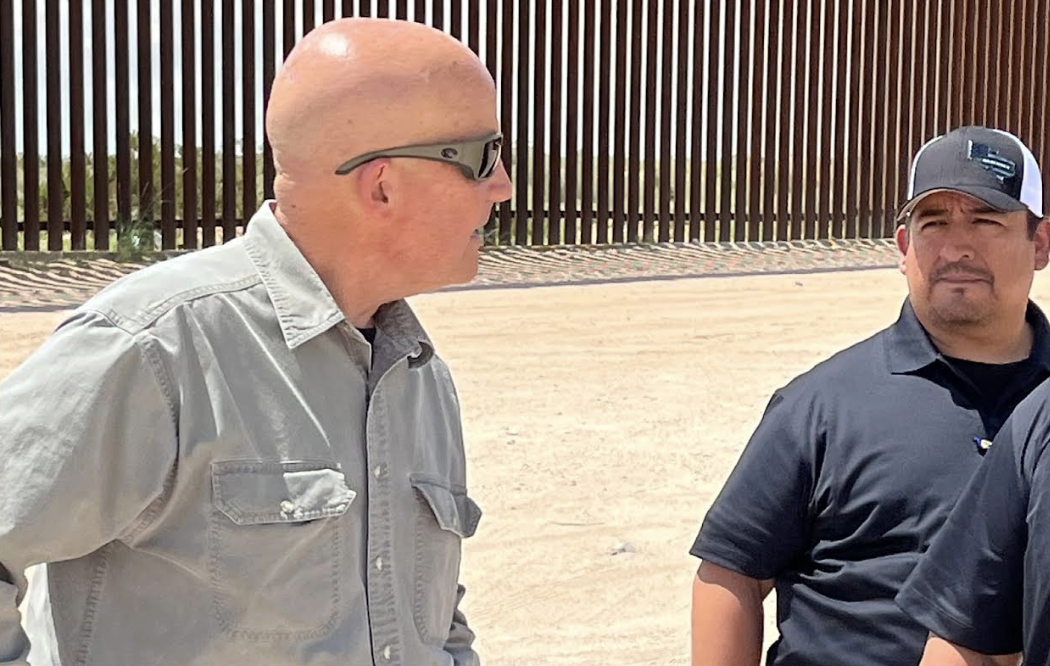 Keith Self at the southern border wall